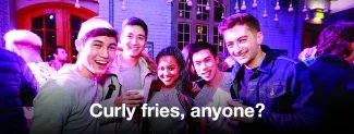 Image of five people smiling in FiveSixEight bar, with text: Curly fries, anyone?